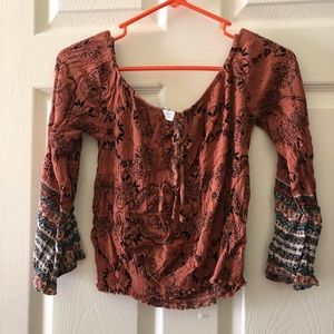 multi colored, off the shoulders shirt